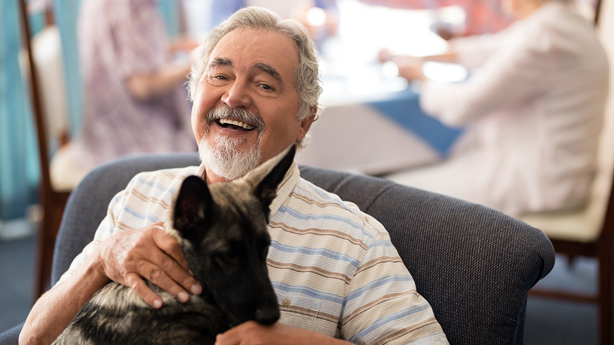 Senior Citizen in Assisted Living Facility With Pet Dog